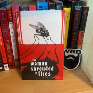 The Woman Shrouded In Flies